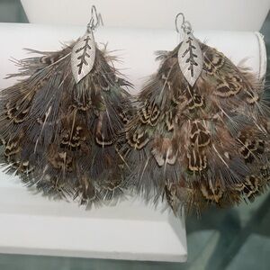 Feather earrings by viviglam 🌹🌹🌹